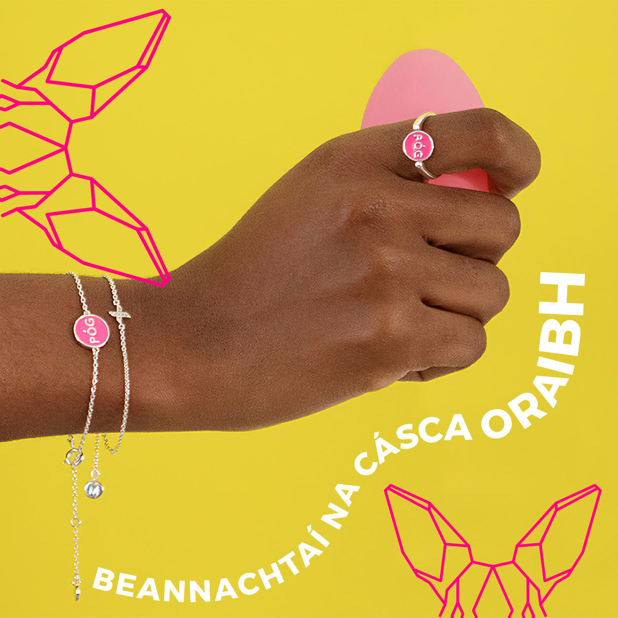 Happy Easter in Irish. A hand adorned with pog bracelet, holding an Easter egg