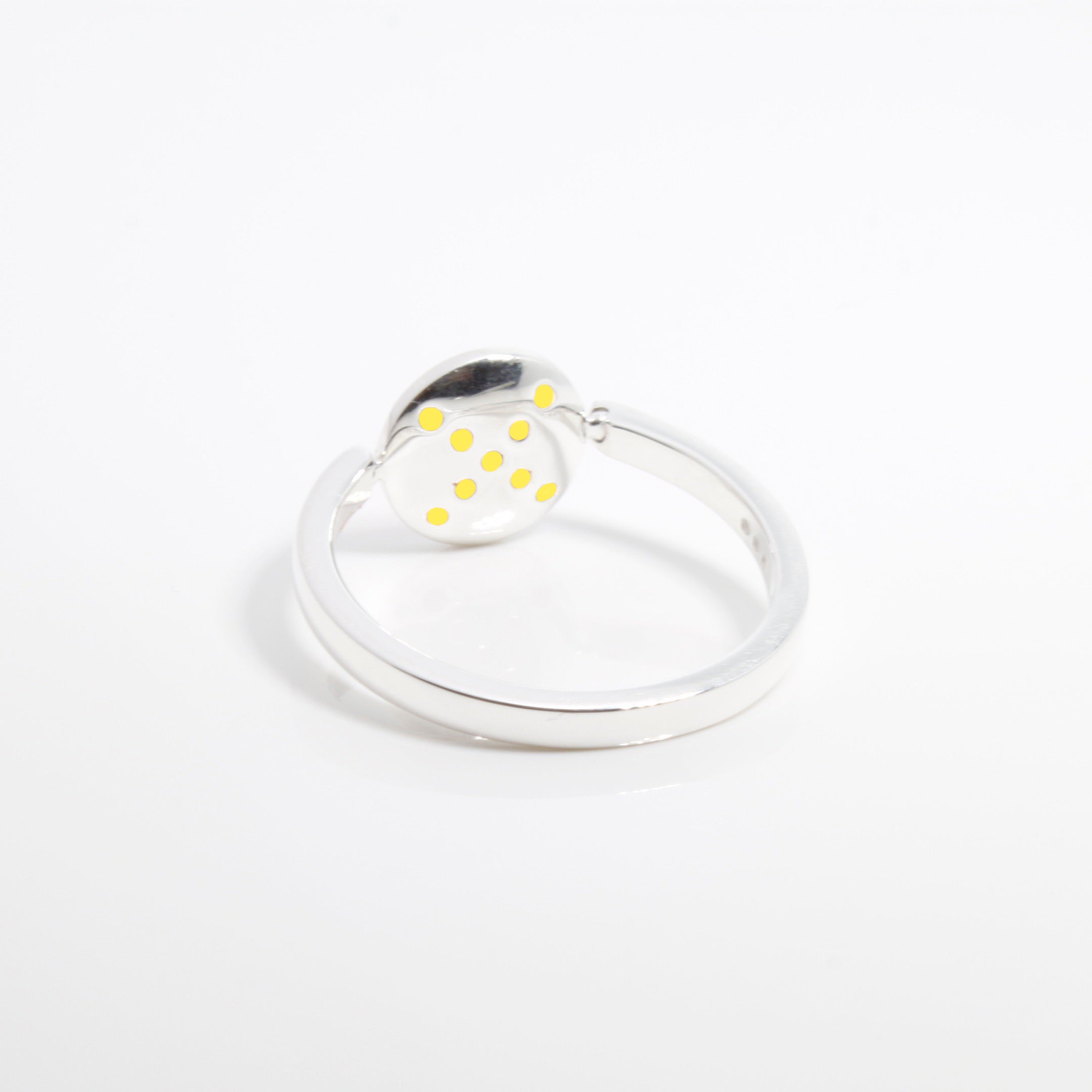 spinning-ring-yellow-silver-back-view