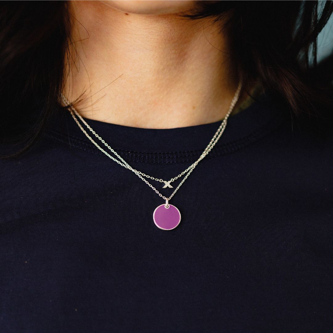 fidget locket_with hidden kiss_ light pink silver_on neck