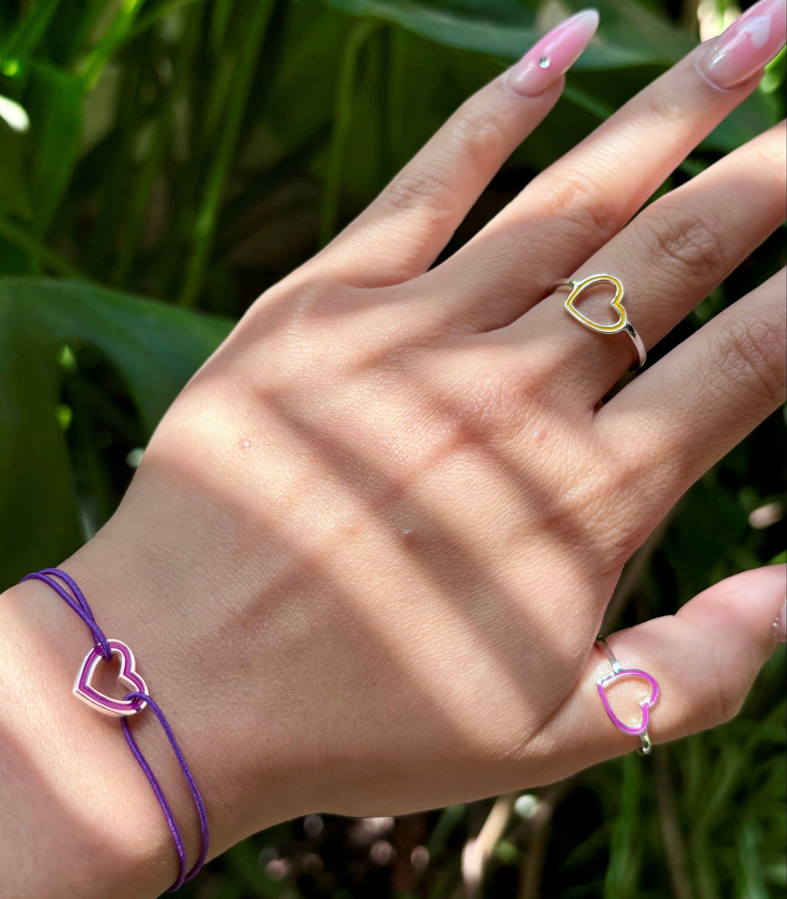 open-heart-bracelet-open-heart-ring-stacking-purple-yellow-silver-on-hand-view