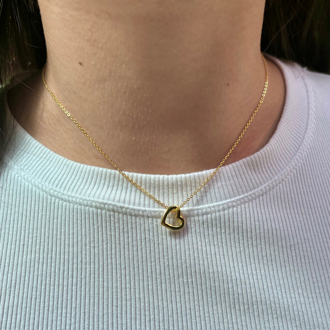 open-heart-necklace-gold-on-neck