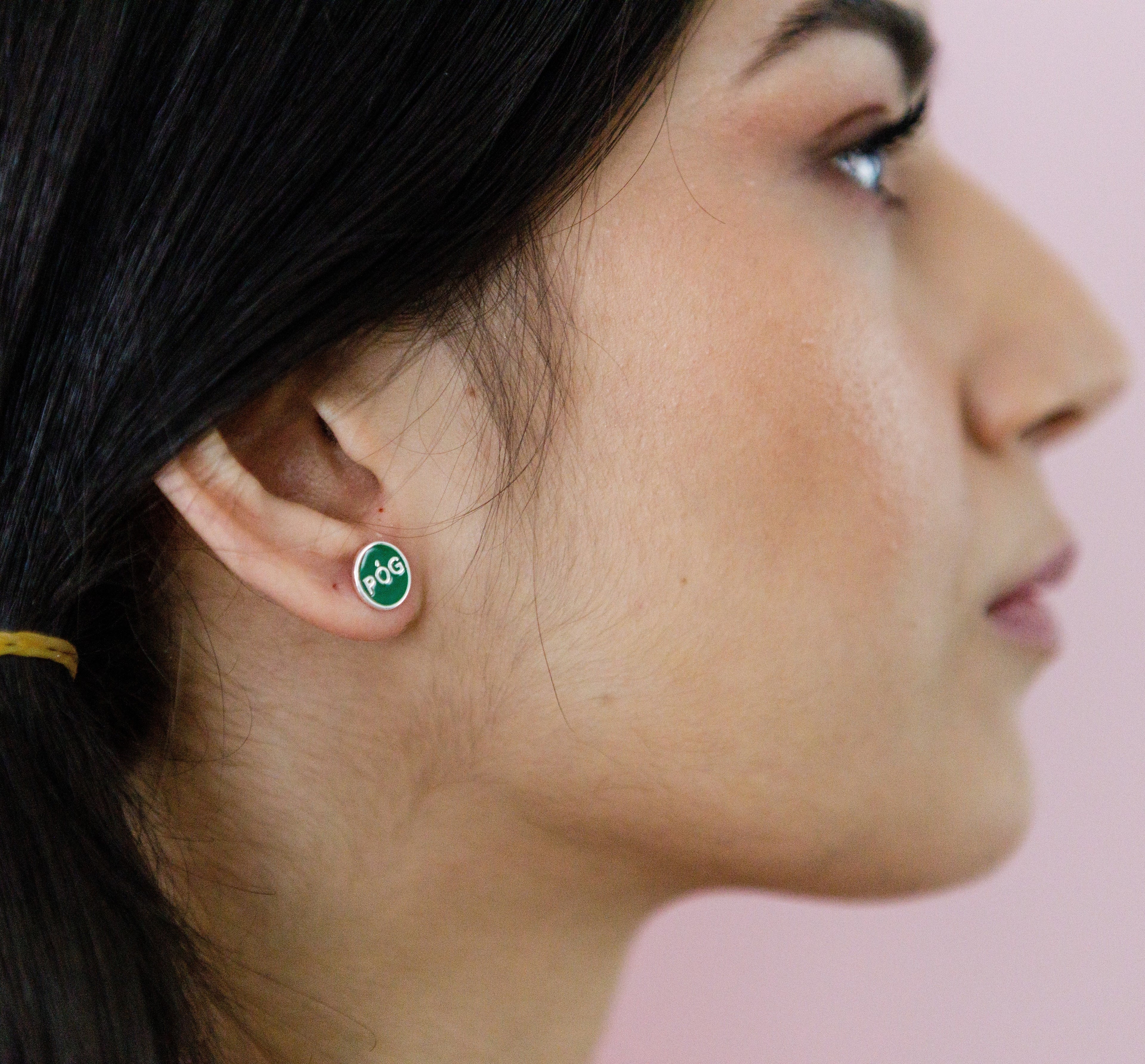 pog-studs-green-silver-on-ear-view