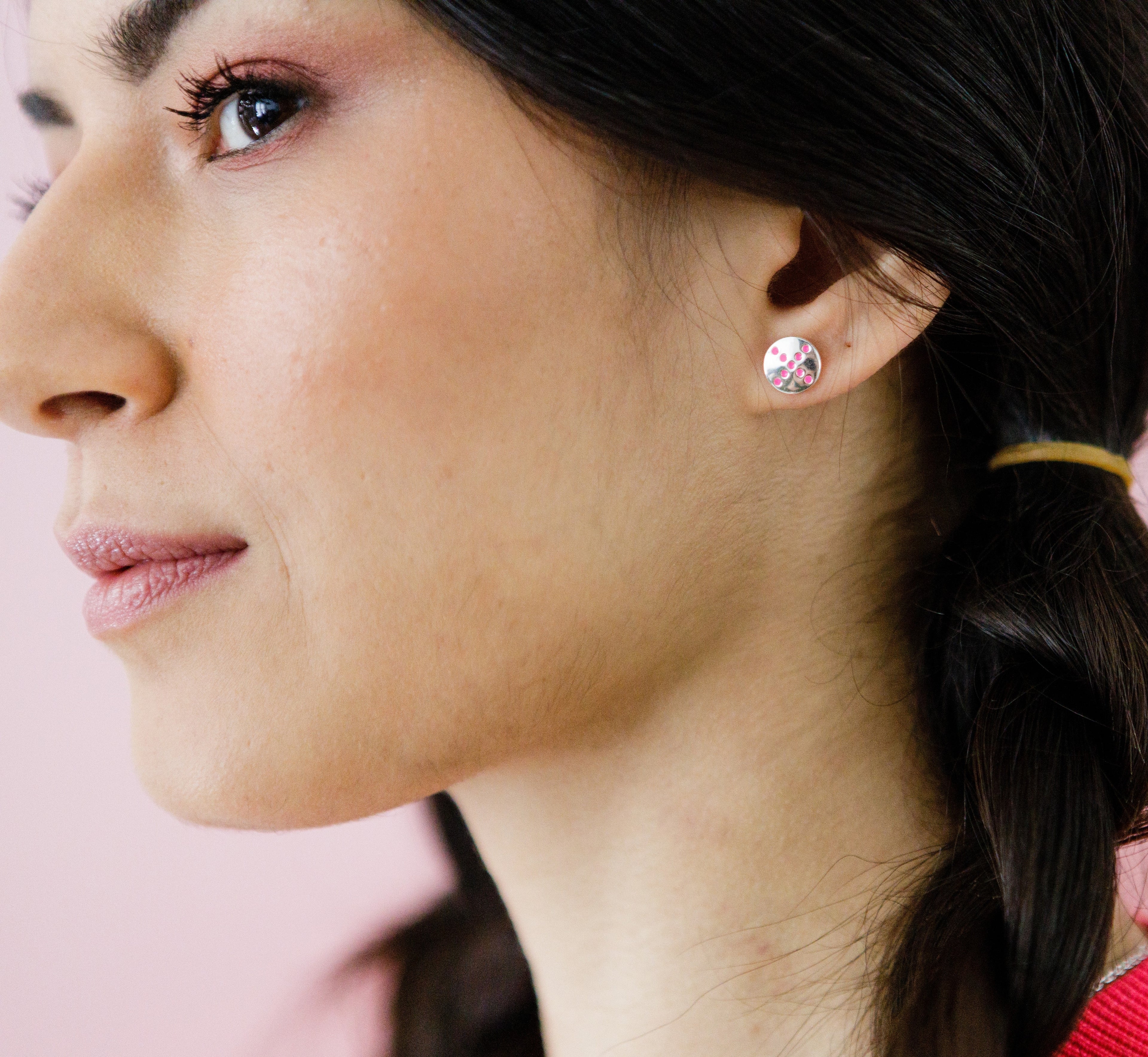 pog-studs-pink-silver-on-ear-view