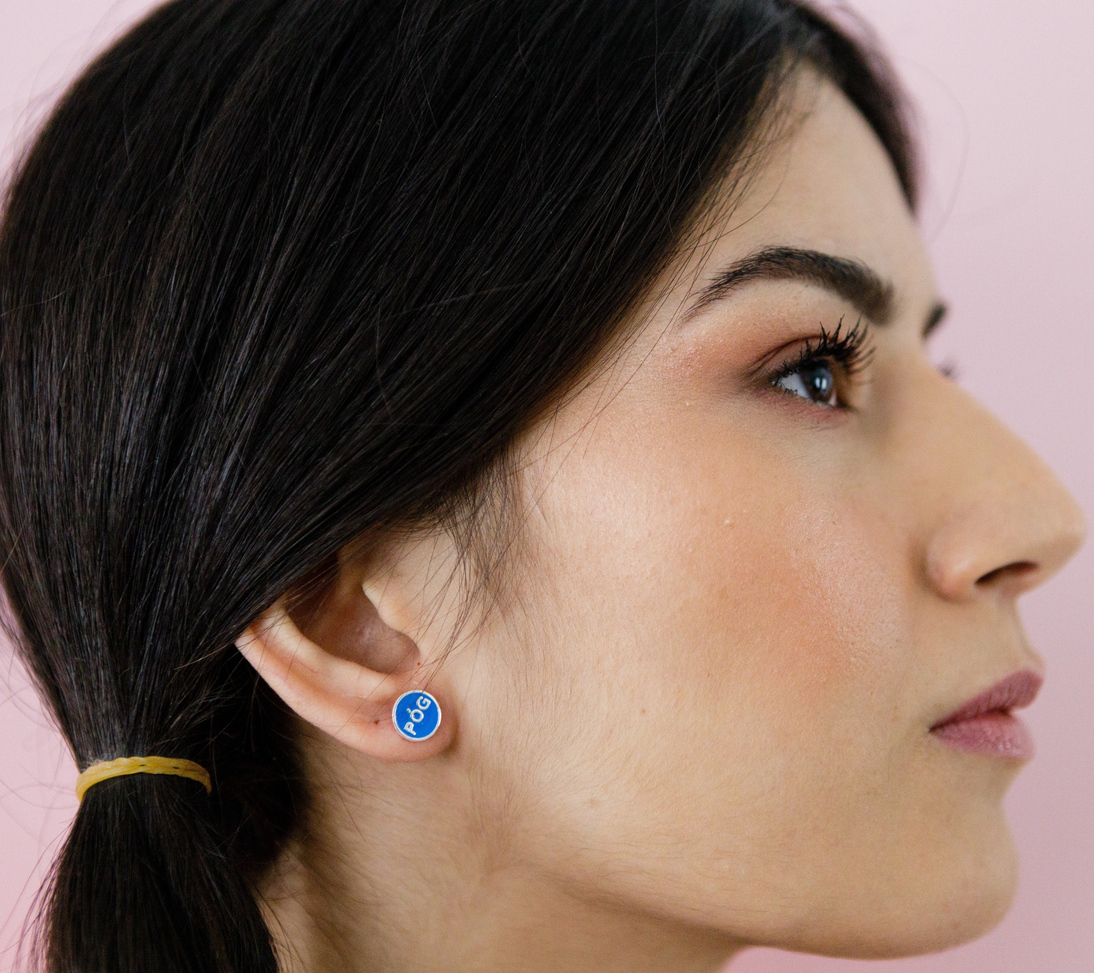 pog-studs-blue-silver-on-ear-view
