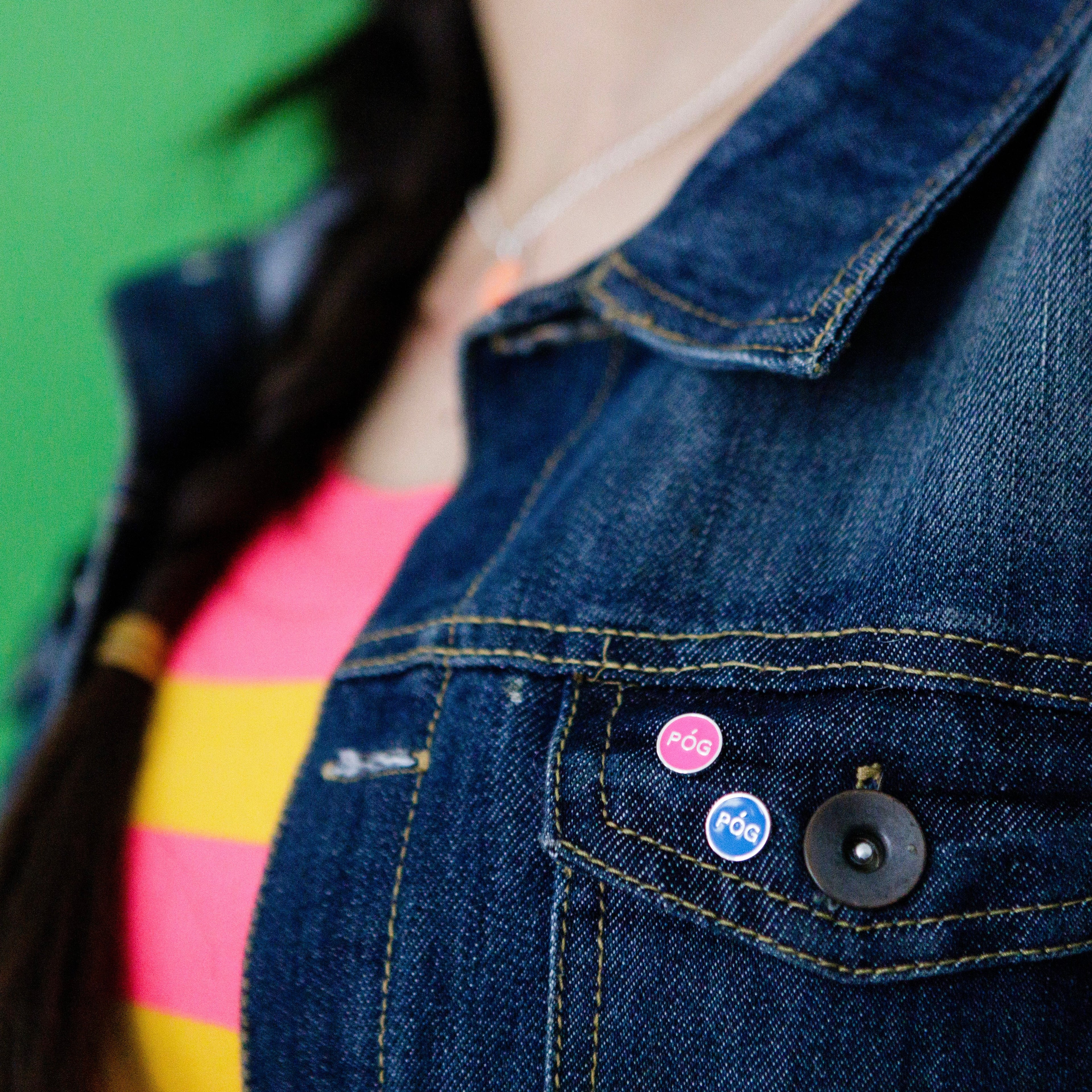 pog-pin-pink-blue-silver-on-shirt-view