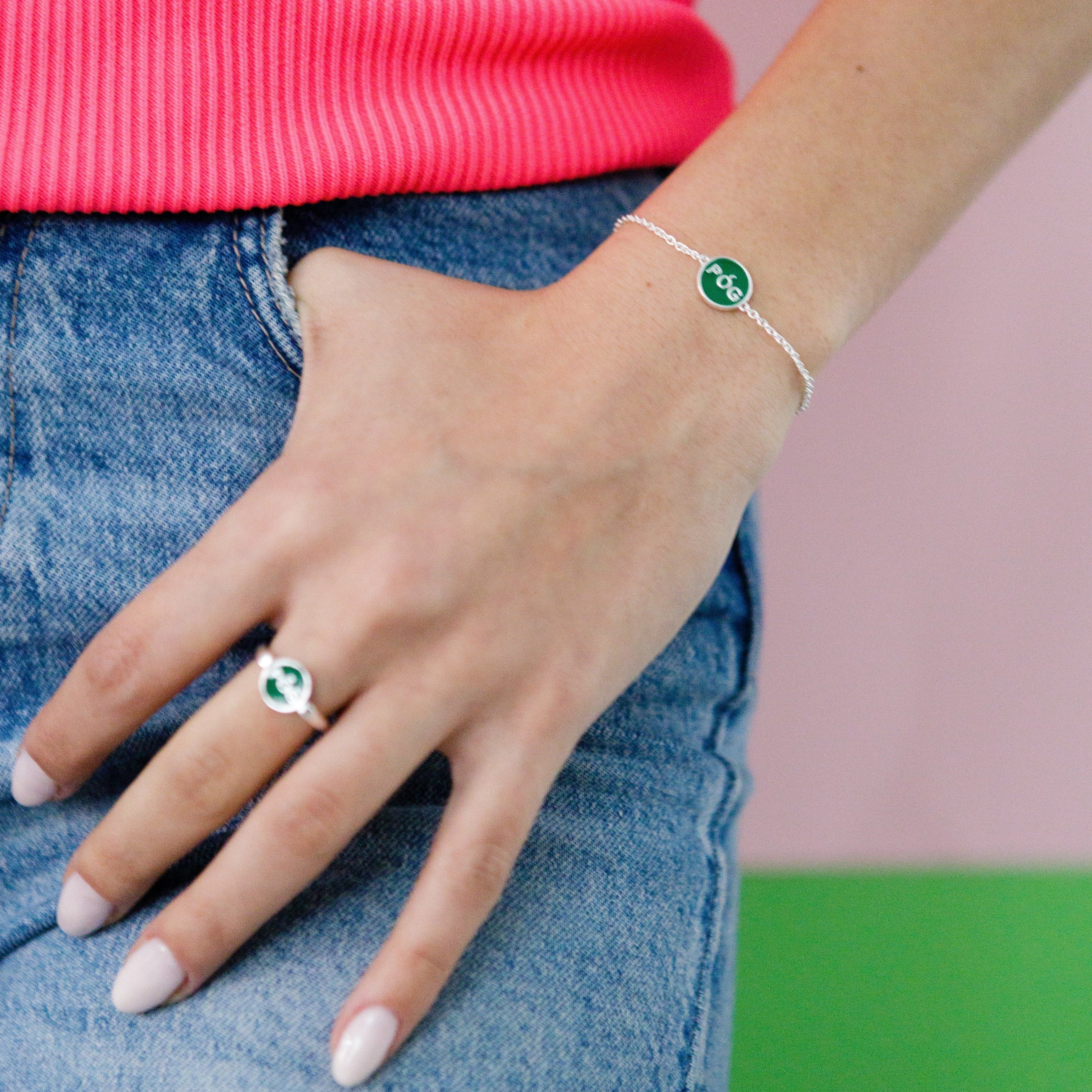 charm-bracelet-stacking-green-silver-on-hand-view