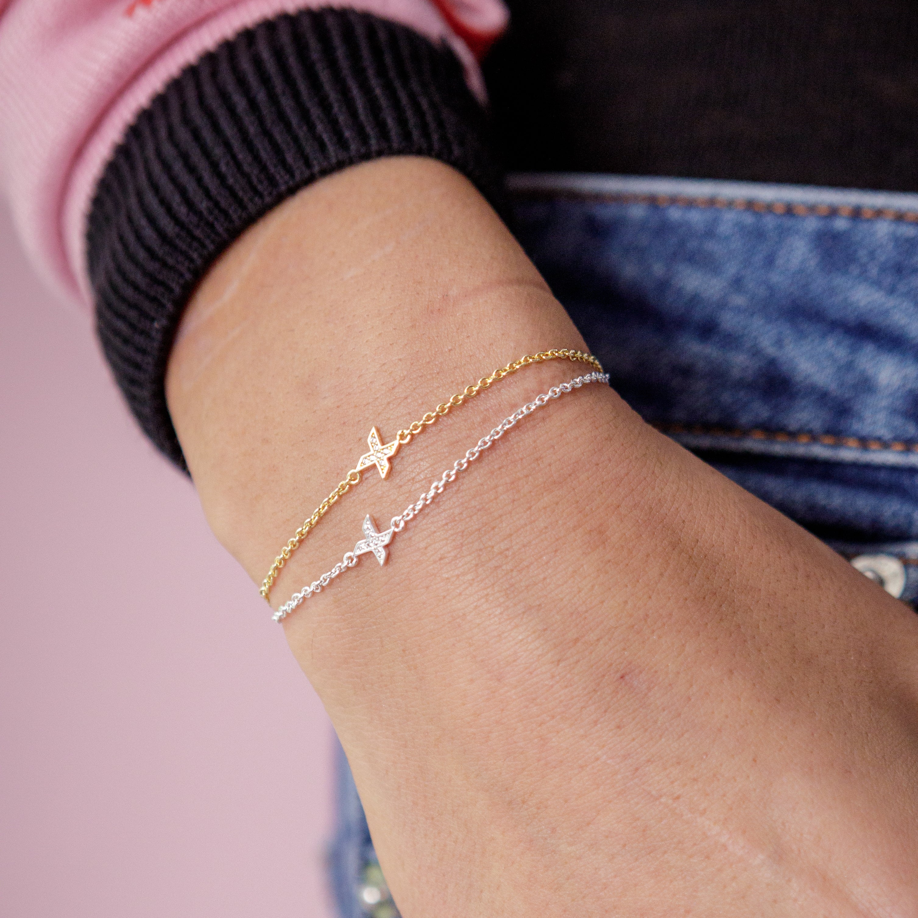 shine-kiss-bracelet-silver-gold-stacking-on-hand-view