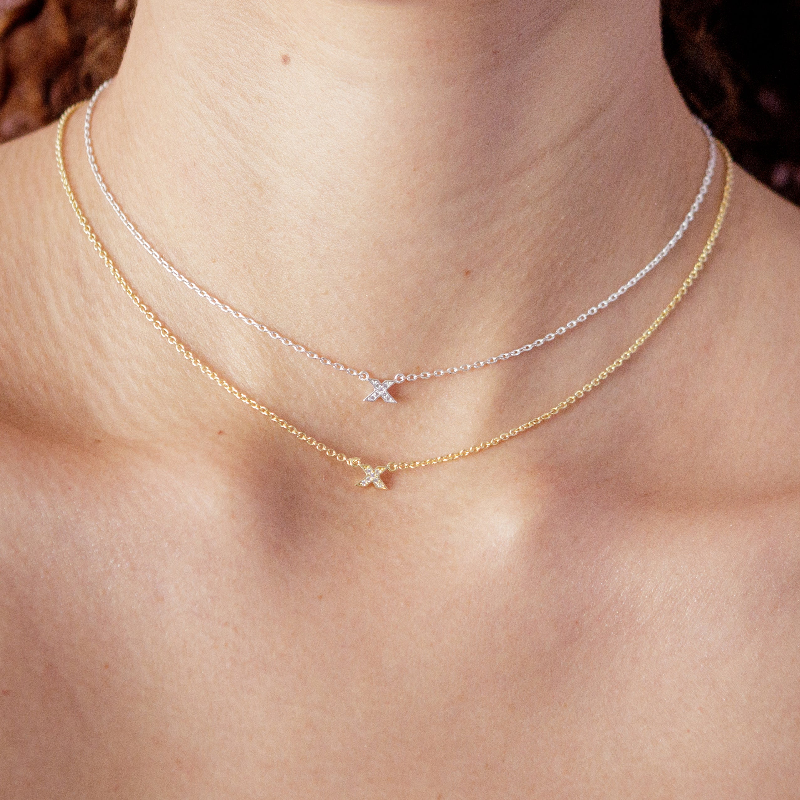 shine-necklace-silver-gold-stacking-on-neck-view