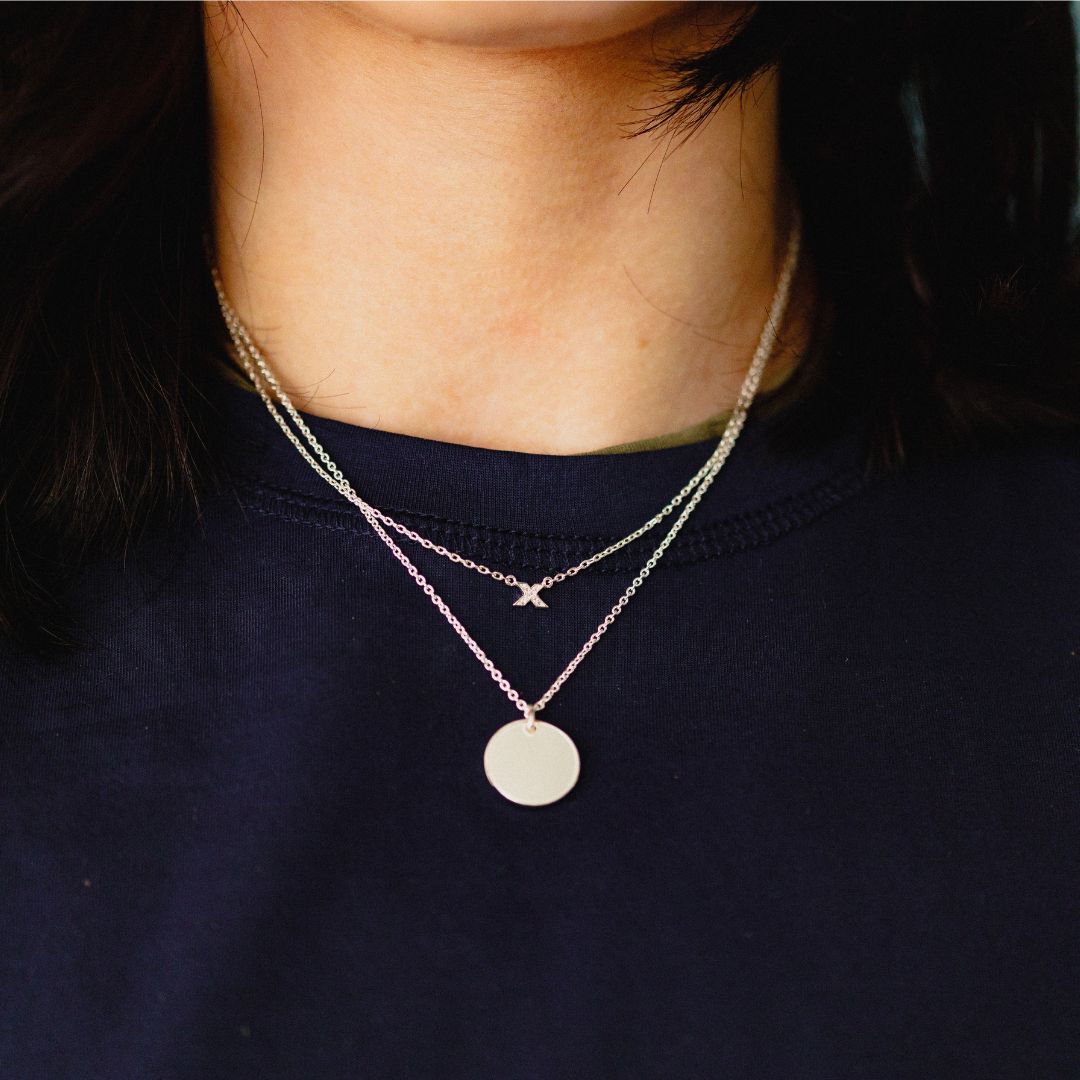 fidget locket_with hidden kiss_ silver_on neck