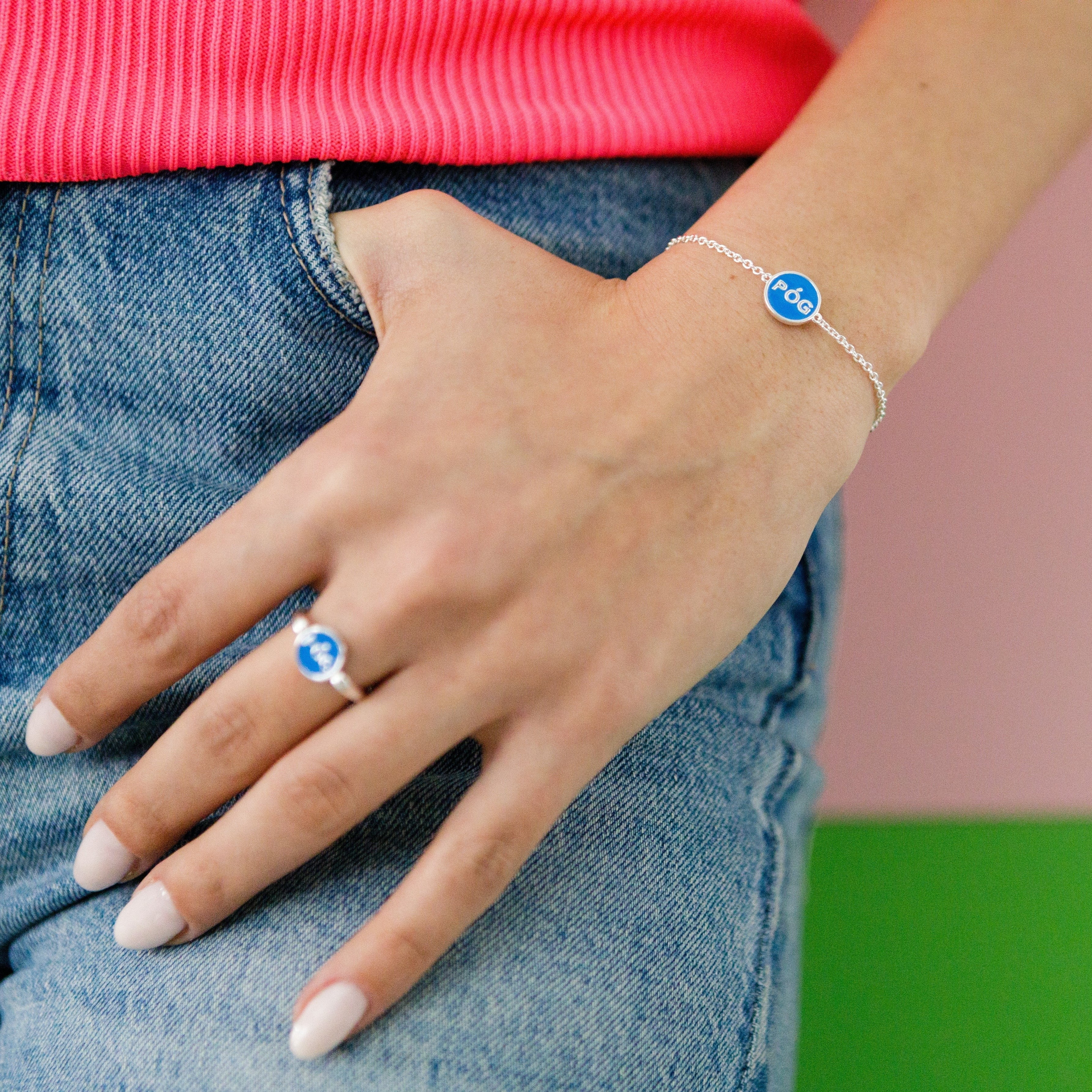 charm-bracelet-stacking-blue-silver-on-hand-view