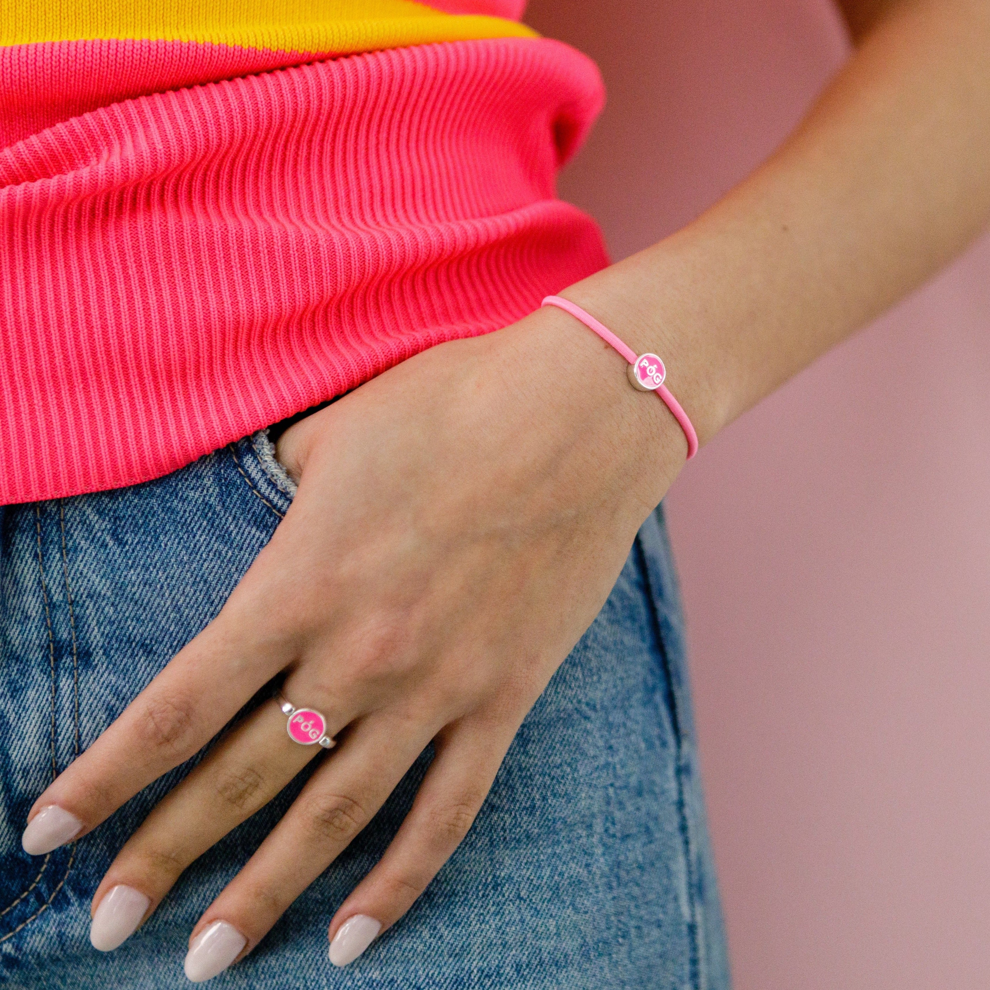 sporty-spinning-bracelet-pink-stacking-on-hand-view