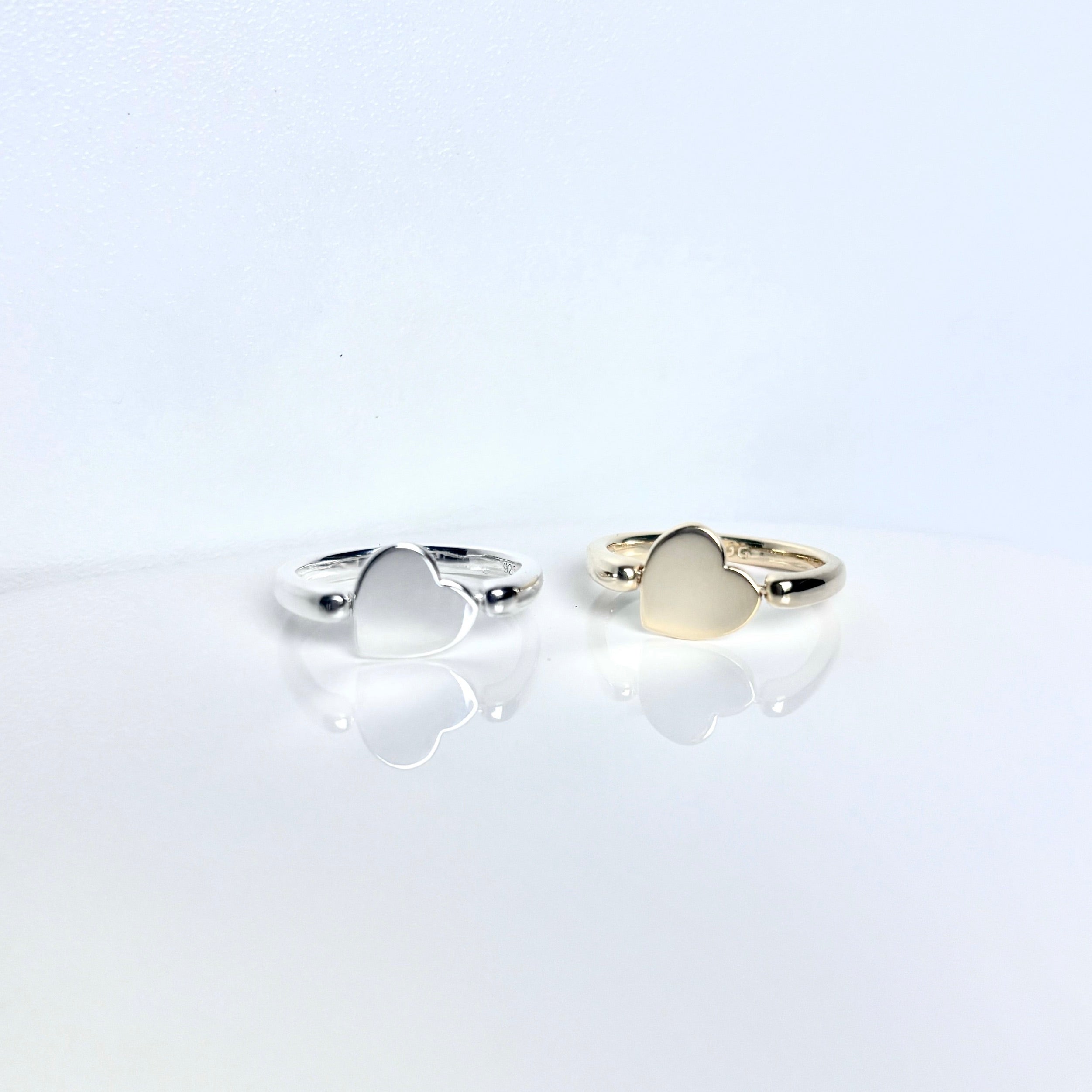póg jewellery_silver and gold fidget rings _front view