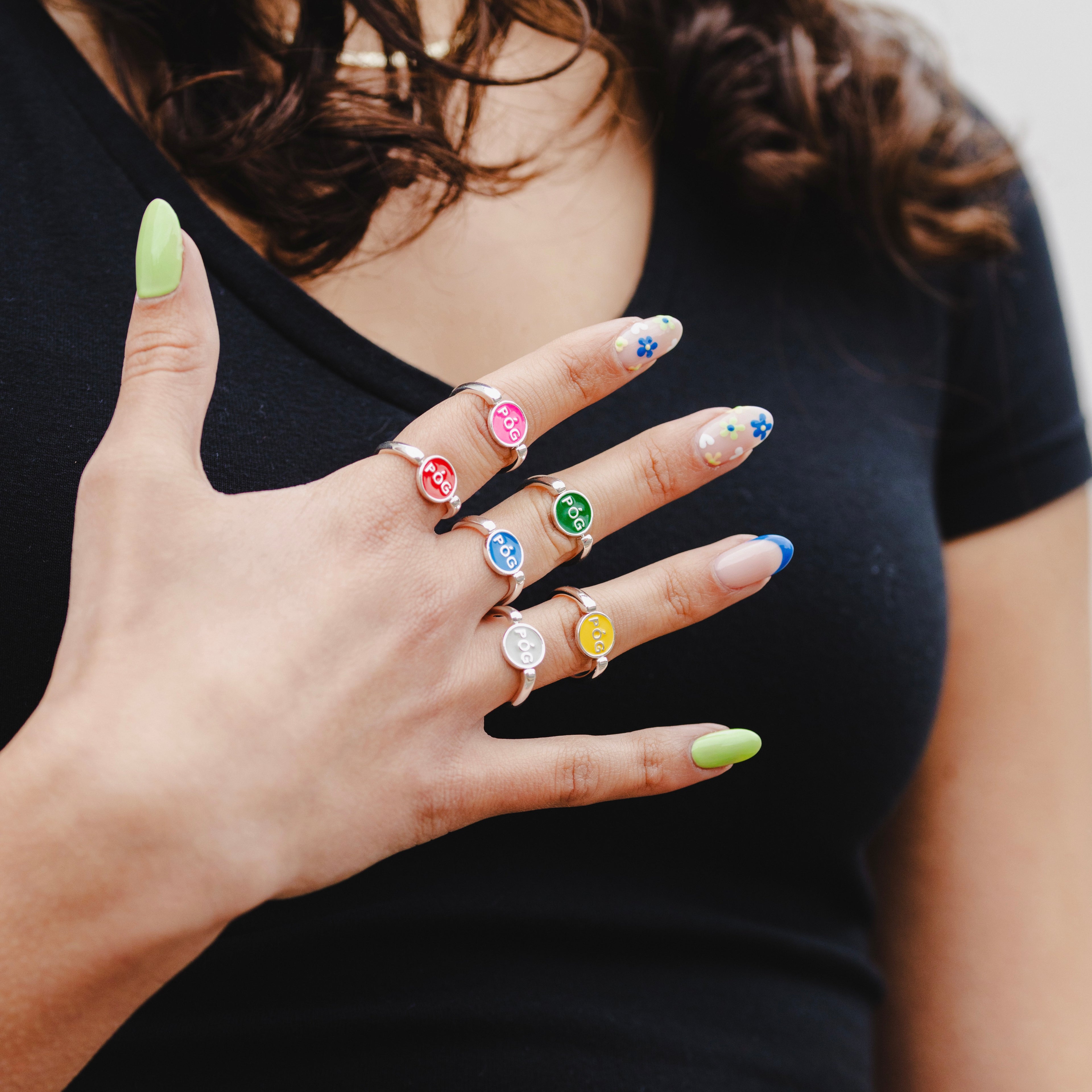 spinning-rings-mixed-staking-silver-on-hand-view