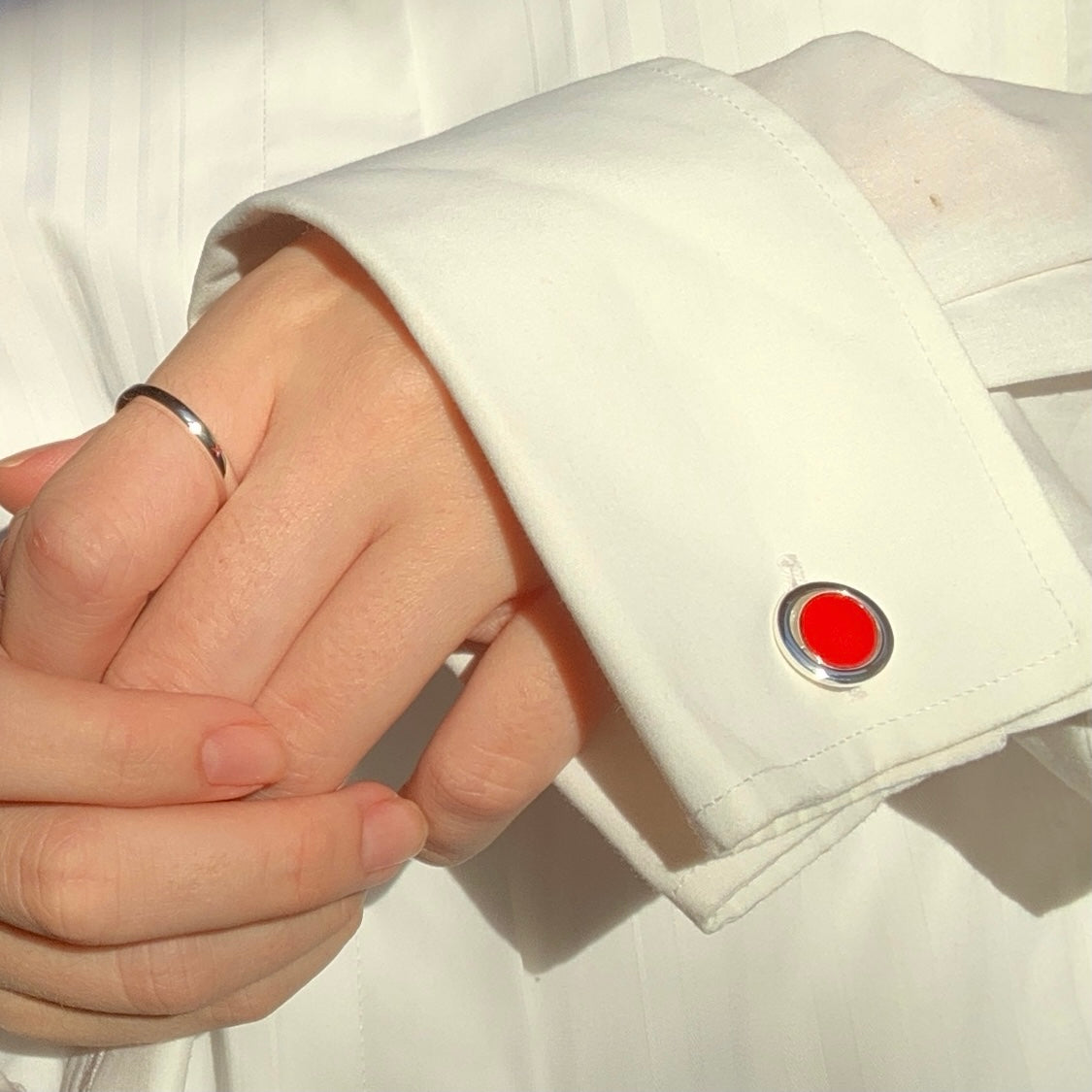 pog-cufflinks-kiss-band-red-silver-on-shirt