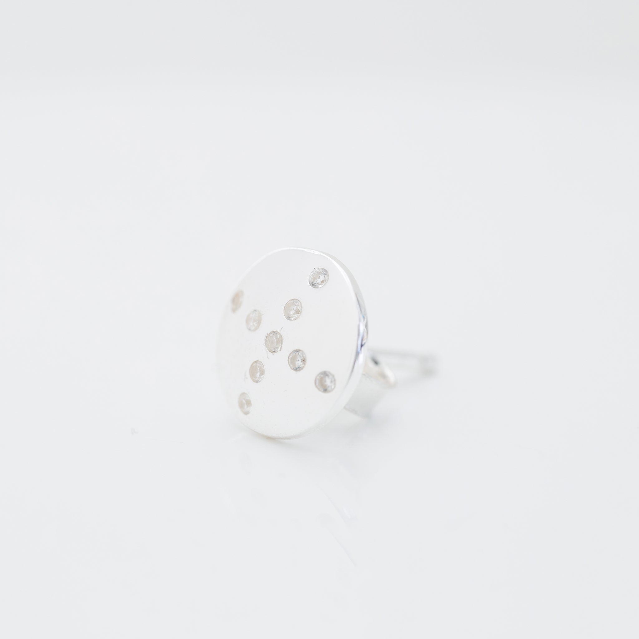 shine-stud-one-piece-silver-front-view