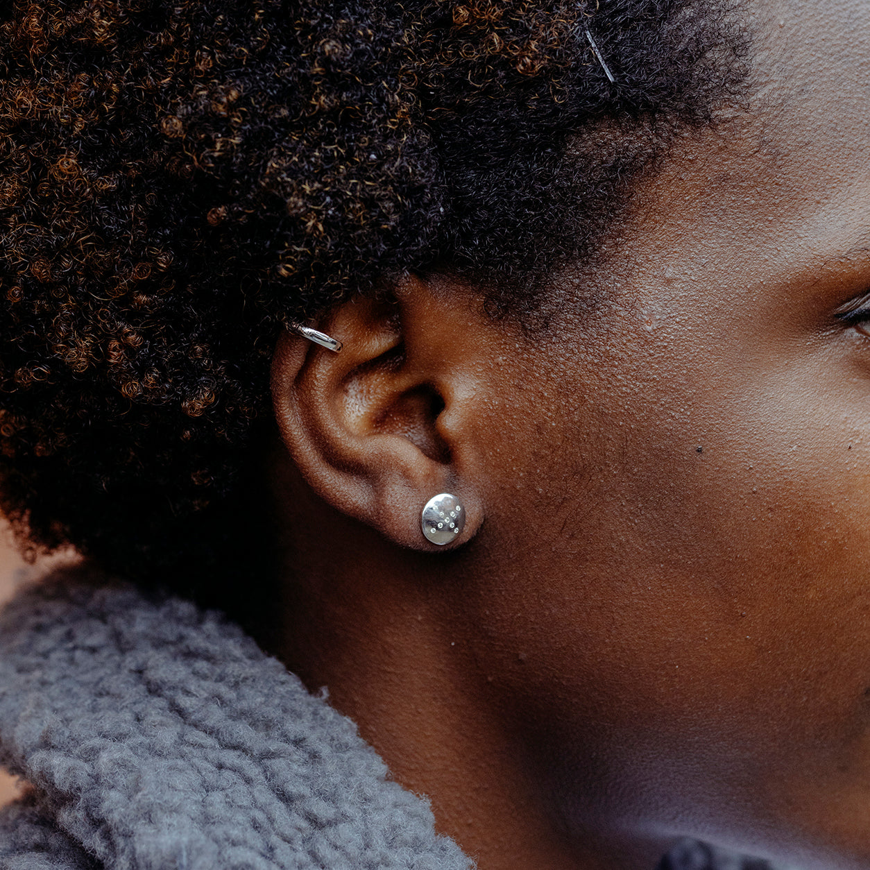 shine-studs-shine-ear-cuffs-silver-stacking-on-ear-view