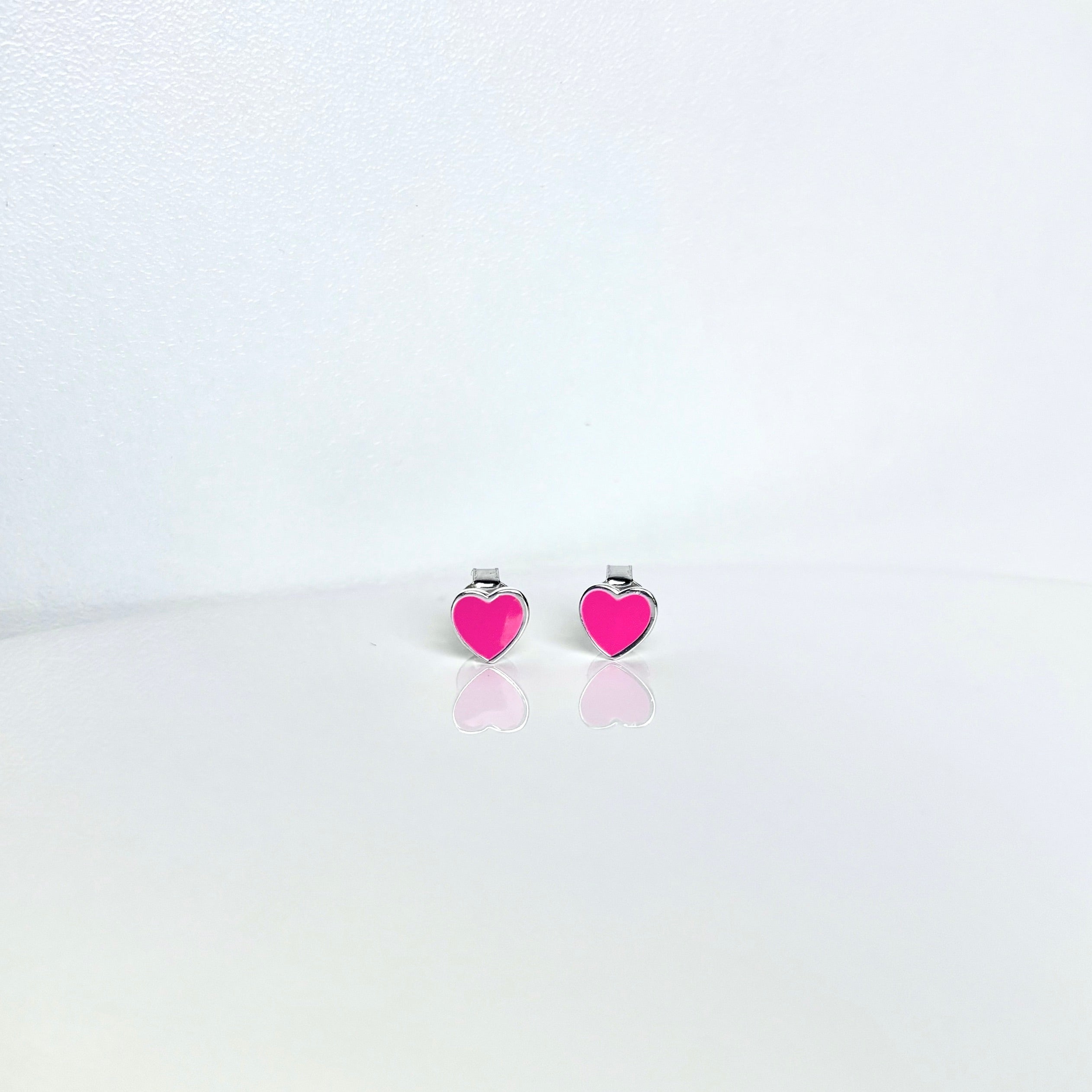 heart stud earrings_pink and silver_frontview