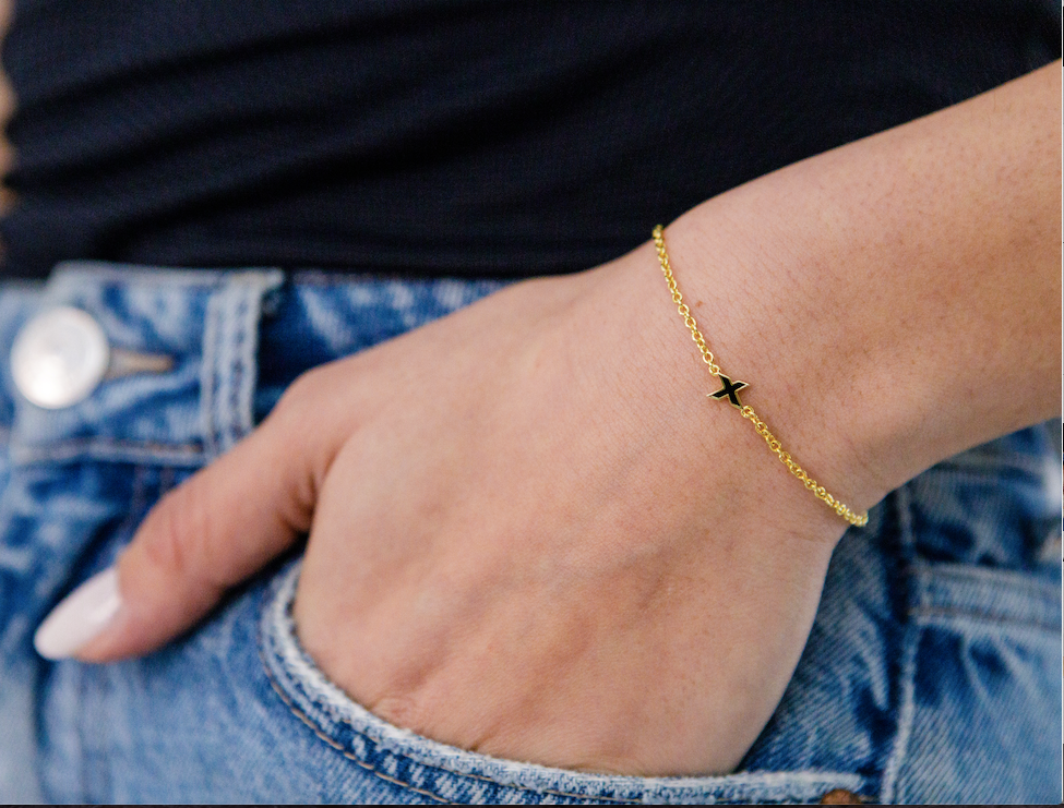 kiss bracelet_black and gold_on wrist