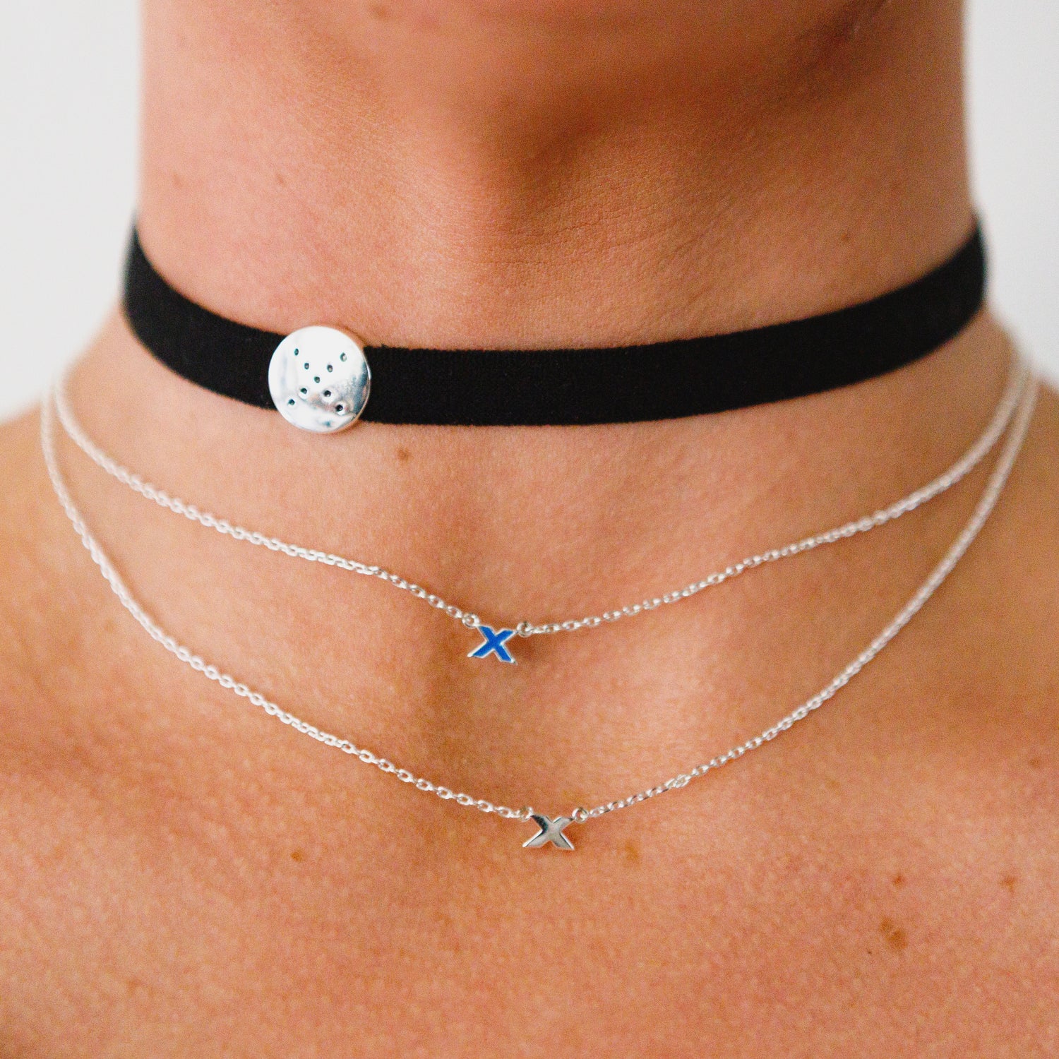 choker-kiss-necklace-stacking-black-blue-silver-on-neck-view