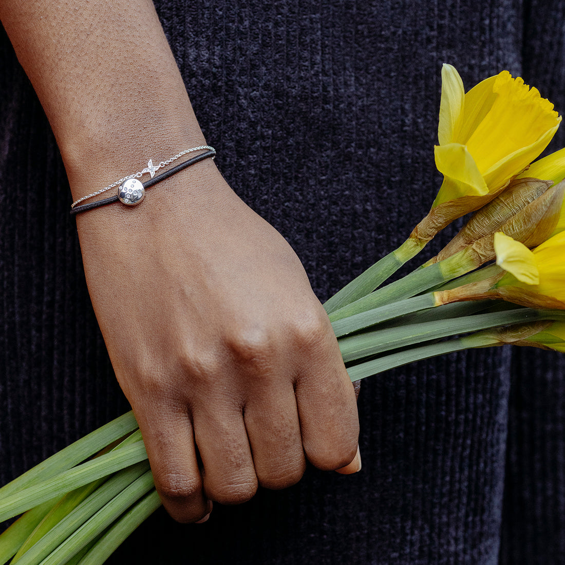 shine-sporty-bracelet-stacking-band-kiss-bracelet-on-hand-view